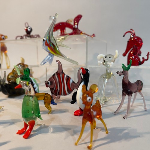 114 - A collection of Murano glass animals including a snail, penguin, Scottie dog, fish, octopus etc. (33... 