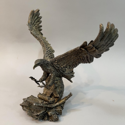 31 - A filled white metal (tests as silver) model of a Bald Eagle by Country Artists, 'Monarch of the Ski... 