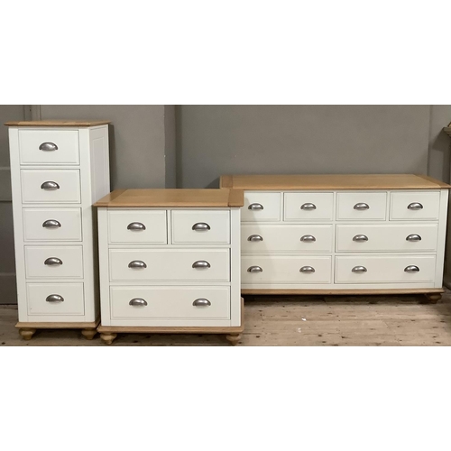 284 - A Cotswold beech bedroom suite painted off white, with a bank of four short above four long drawers ... 