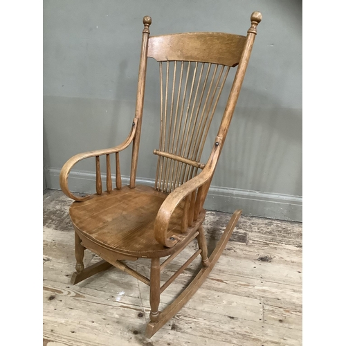 247 - An American bentwood rocking chair with spindle back c. 1900