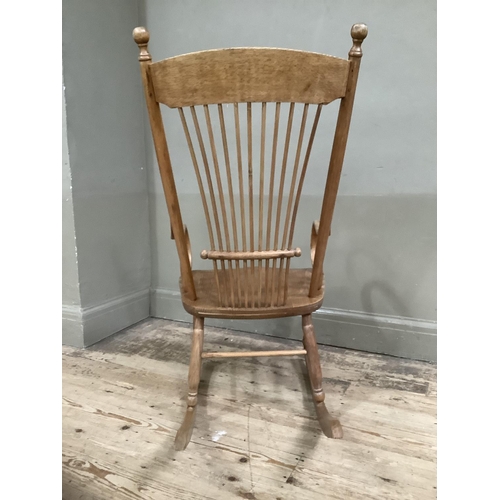 247 - An American bentwood rocking chair with spindle back c. 1900