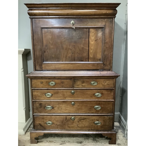 254 - A 19th century continental mahogany secretaire abbatant with drop down fall having a fitted interior... 