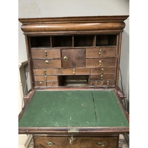 254 - A 19th century continental mahogany secretaire abbatant with drop down fall having a fitted interior... 