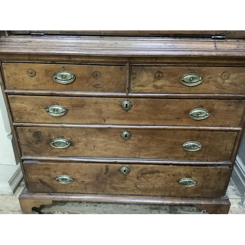 254 - A 19th century continental mahogany secretaire abbatant with drop down fall having a fitted interior... 