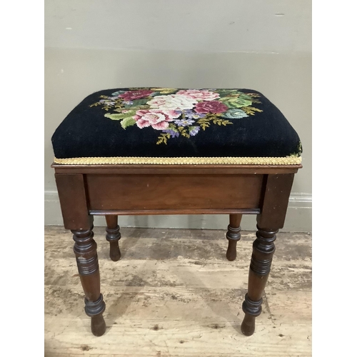 264 - A mahogany piano stool converted to a sewing box on turned legs with contents