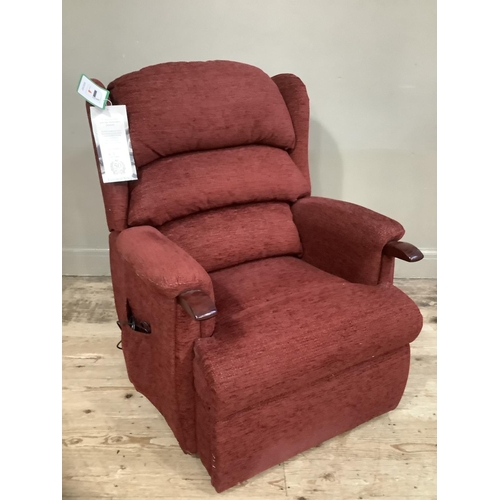 265 - A HSL Craftsman electric recliner chair upholstered in burgundy fabric