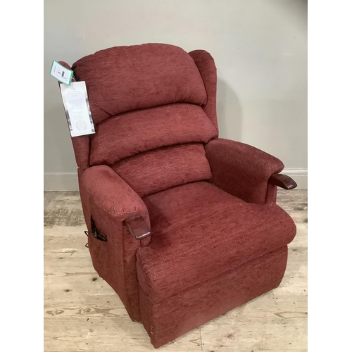 265 - A HSL Craftsman electric recliner chair upholstered in burgundy fabric