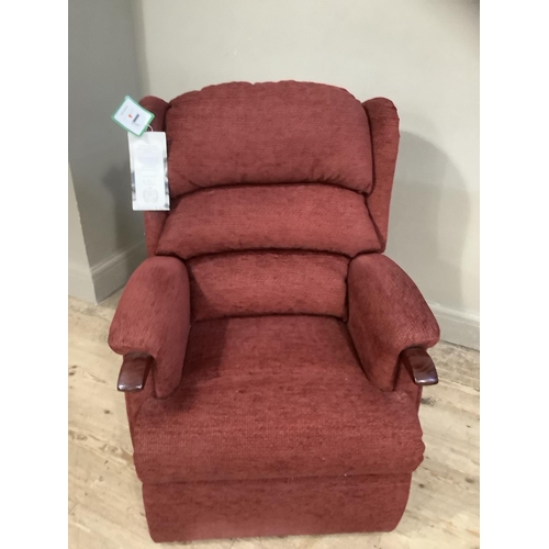 265 - A HSL Craftsman electric recliner chair upholstered in burgundy fabric