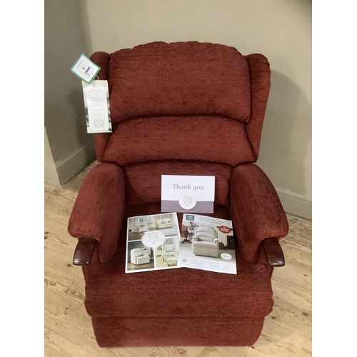 265 - A HSL Craftsman electric recliner chair upholstered in burgundy fabric