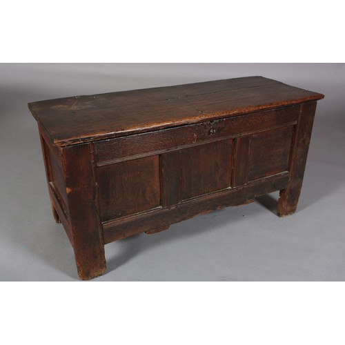 231 - AN EARLY 18TH CENTURY OAK JOINED CHEST, having a planked top above a triple indented panel front, pl... 