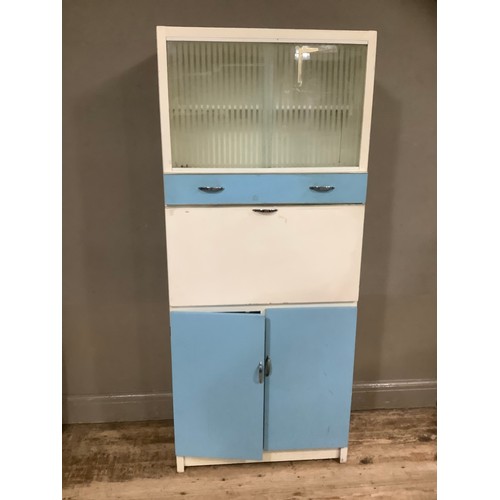 76 - A mid century blue formica kitchen cabinet with glazed unit an drop down front