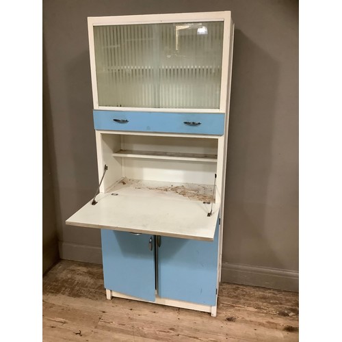 76 - A mid century blue formica kitchen cabinet with glazed unit an drop down front