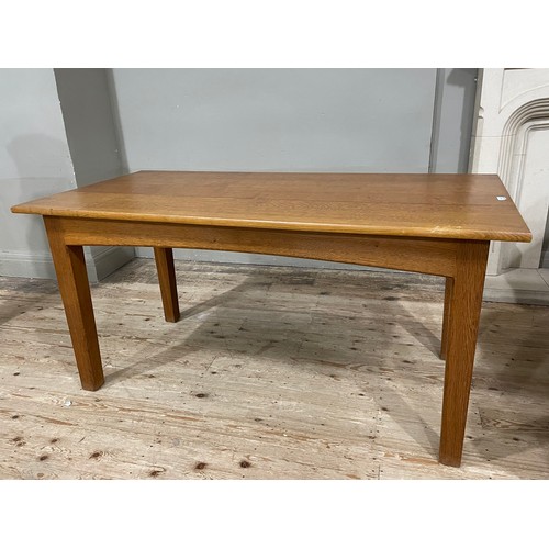 285 - An Arts and Crafts style Peter Hall of Cumbria Lakes School oak dining table 153cm x 73cm