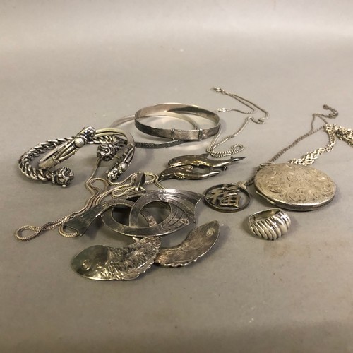 203 - A collection of silver and white metal jewellery (this metal tests as silver) including bangles, nec... 