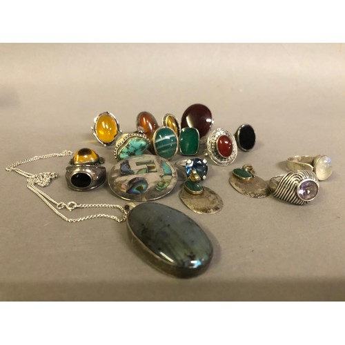 202 - A collection of silver stone set jewellery including a pendant, earrings and a brooch, variously set... 