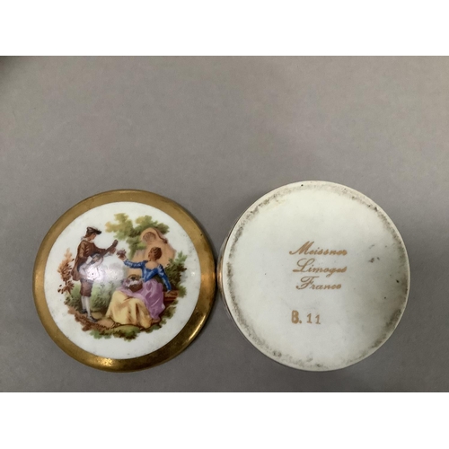 21 - A Meissen sweetmeat dish with reclining gentleman in blue floral jacket, the dish painted with insec... 