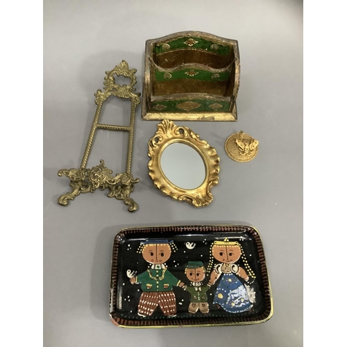 108 - A gilt small picture easel, a small gilt oval mirror, a gilt pen holder with a small insect, a lacqu... 