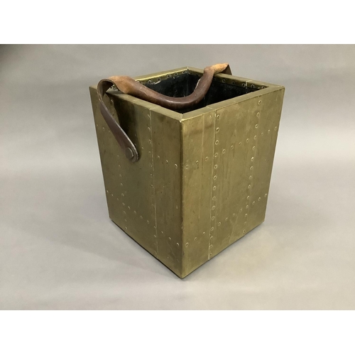 112 - Brass bound rectangular box with leather strap, 30cm high