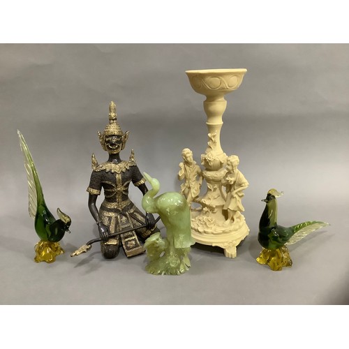 144 - A Chinese onyx carved heron, two Murano pheasants, a continental resin candle holder formed as a col... 