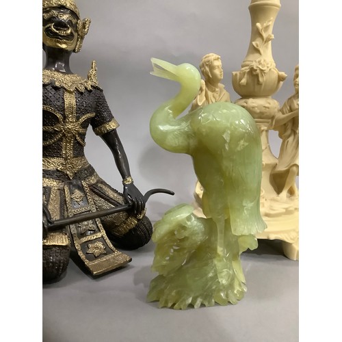 144 - A Chinese onyx carved heron, two Murano pheasants, a continental resin candle holder formed as a col... 