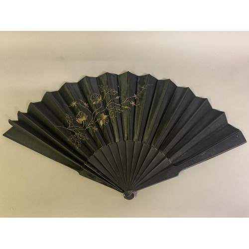 21 - Three fans from the 1890’s: a large wood fan with cream cotton leaf, painted with Pierrot kneeling o... 