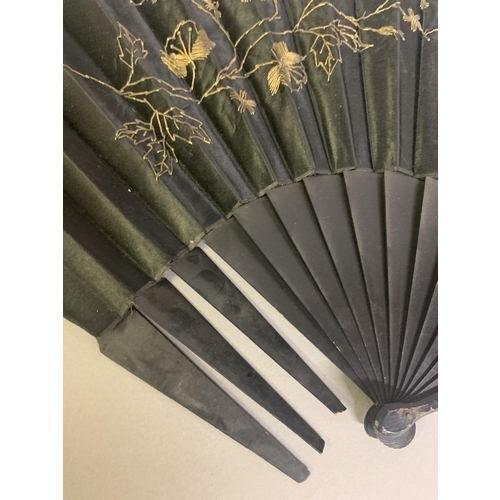 21 - Three fans from the 1890’s: a large wood fan with cream cotton leaf, painted with Pierrot kneeling o... 