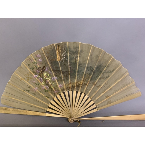 22 - Four late 19th century fans: the first quite simple, French, wood monture,
 The paper leaf inscribed... 