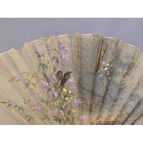 22 - Four late 19th century fans: the first quite simple, French, wood monture,
 The paper leaf inscribed... 