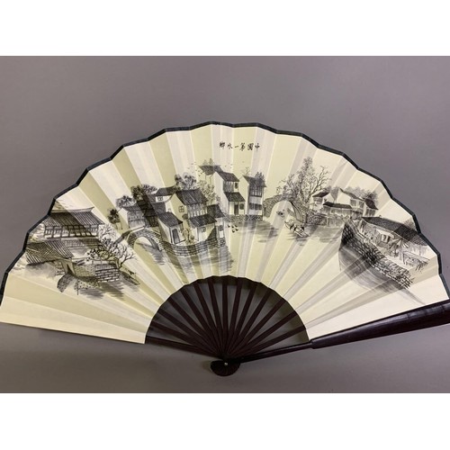 119 - Four oriental fans: a 19th century Japanese wood brisé the 18 inner sticks and two guards with round... 