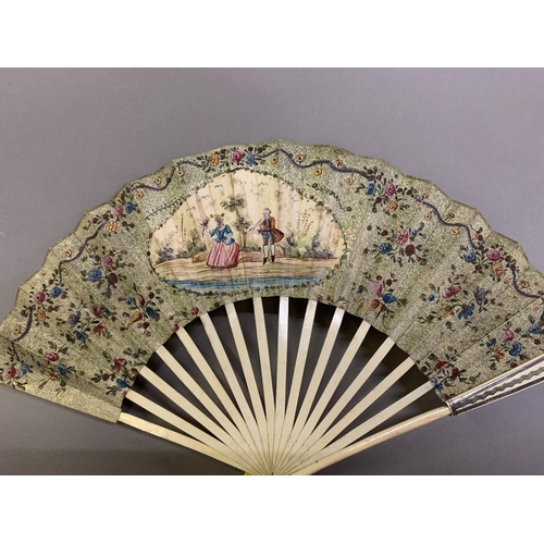 5 - The 18th century: a very classical folding fan, the double paper leaf with central cartouche showing... 