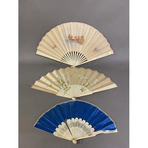 39 - Two cream fans from the 1890’s, the first painted with a gathering of naked cherubs or children on a... 