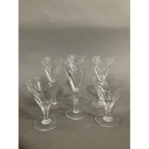 38 - A suite of mixed cut glasses comprising five hocks, four flutes, four red wines, four tumblers, six ... 