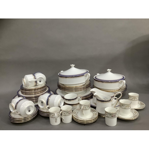 43 - A Paragon lilac and gilt dinner service for eight comprising dinner plates, soup bowls, cups and sau... 