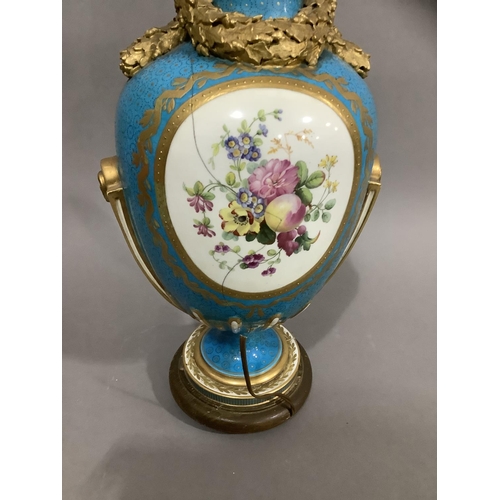 5 - A French Sevres style vase converted to a lamp, the ovoid body painted with a mother and child in ki... 