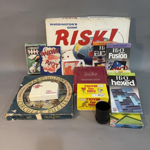 34 - Vintage board games comprising Waddington's circular puzzle, Risk, Trivial Pursuit etc.