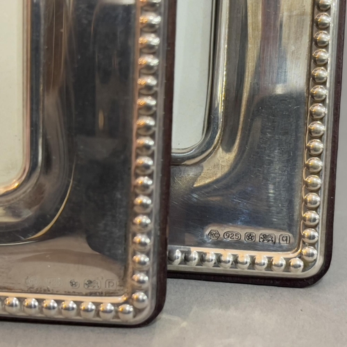 183 - A pair of modern sterling silver photograph frames of graduated size, by Carrs of Sheffield, 19cm x ... 