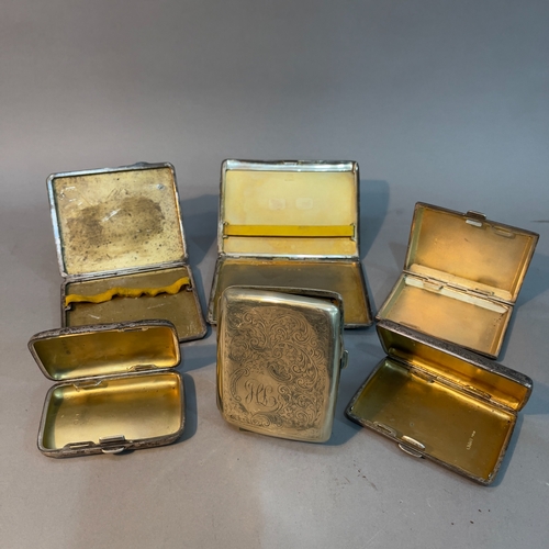 181 - Five early to mid 20th century silver cigarette cases together with one silver plated cigarette case... 