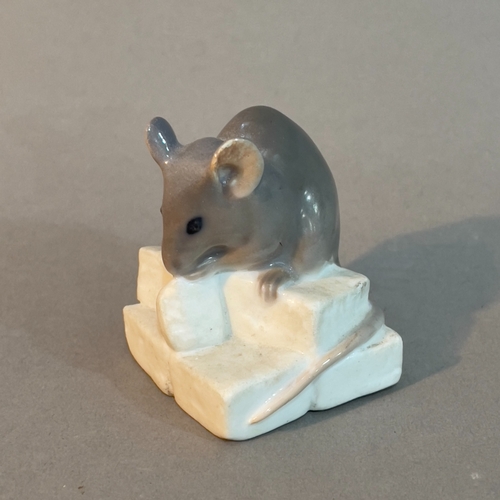 26 - A Royal Copenhagen figure of a mouse on sugar, no.510, 4cm high