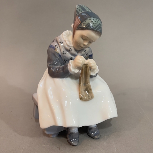 4 - A Royal Copenhagen figure of a woman darning 1314, 15cm high