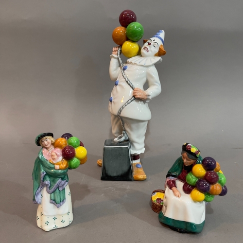 75 - A Royal Doulton figure 'Balloon Clown' 24cm, 'The Old Balloon Seller' 8cm high, 'The Balloon Seller'... 