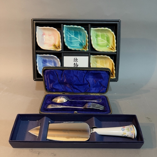 68 - A Royal Worcester cake slice, five Japanese ceramic leaf bowls and a silver plated fork and spoon in... 