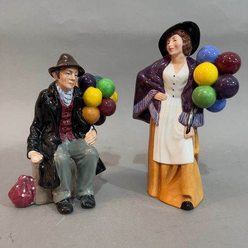 51 - A Royal Doulton figure 'Balloon Lady' 21cm high and 'The Balloon Man' 19cm high