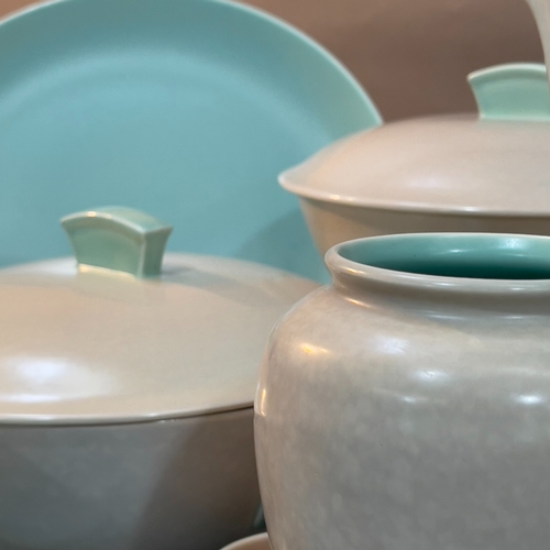 86 - A collection of Poole pottery tableware in grey and blue