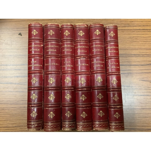 59 - Uniform bound set of Ainsworth's Novels in scarlet Morocco half calf binding with marbled boards and... 