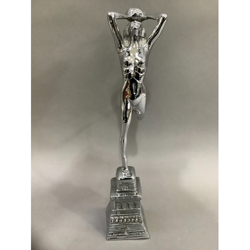 67 - An Art Deco style chrome figure of girl with ball on moulded base, 43cm high