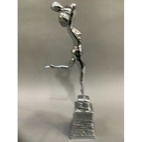 67 - An Art Deco style chrome figure of girl with ball on moulded base, 43cm high