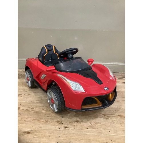 162 - A child's battery operated car in red (re-chargeable battery but no leads)