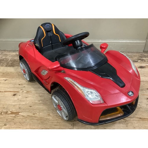 162 - A child's battery operated car in red (re-chargeable battery but no leads)