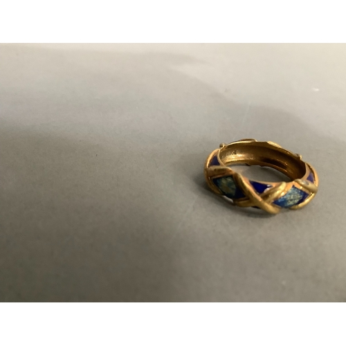 201 - An enamel band ring (at fault) in yellow metal (tests as 14ct gold), approximate weight 6g