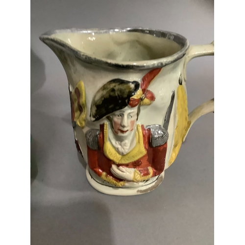 53 - A 19th century Prattware jug painted with Wellington, impressed Marquis Wellington with silver lustr... 